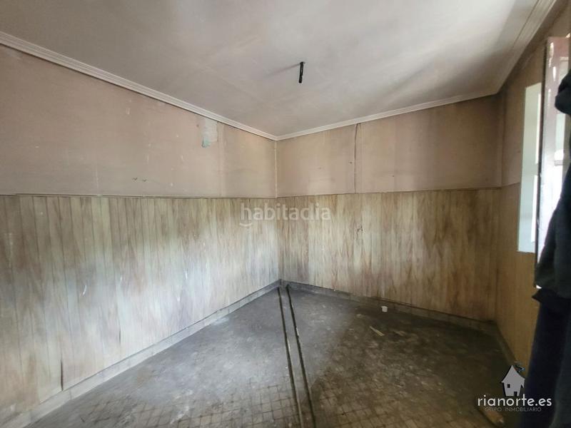 Foto 1e29a821-060b-4aa5-9d7a-6eef29fd9960. Casa  de planta baja y piso con patio trasero, en la vega, pando, para reformar. infórmese !! en Langreo