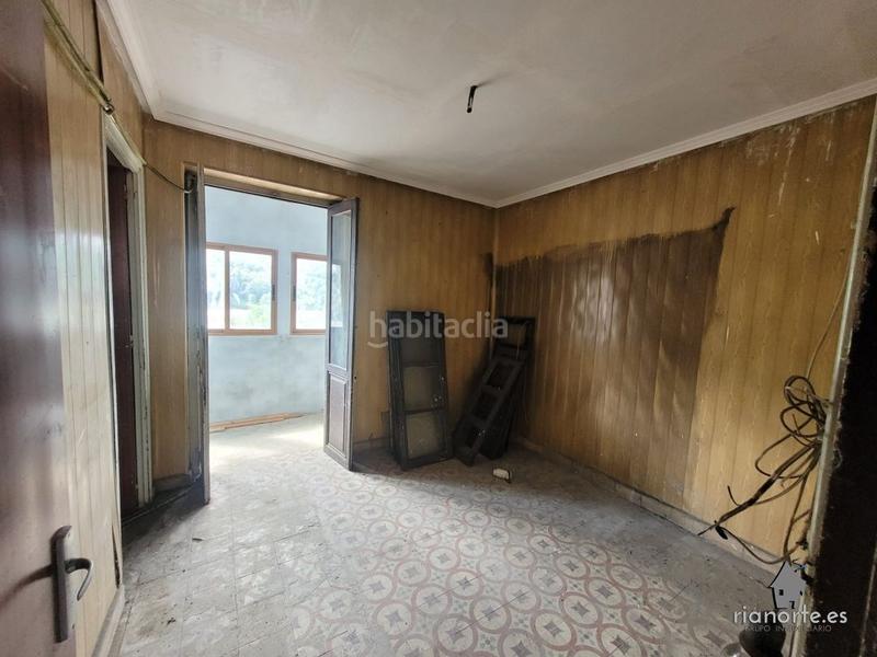 Foto 6841e3a8-ed41-4323-a26b-be60f9a58333. Casa  de planta baja y piso con patio trasero, en la vega, pando, para reformar. infórmese !! en Langreo