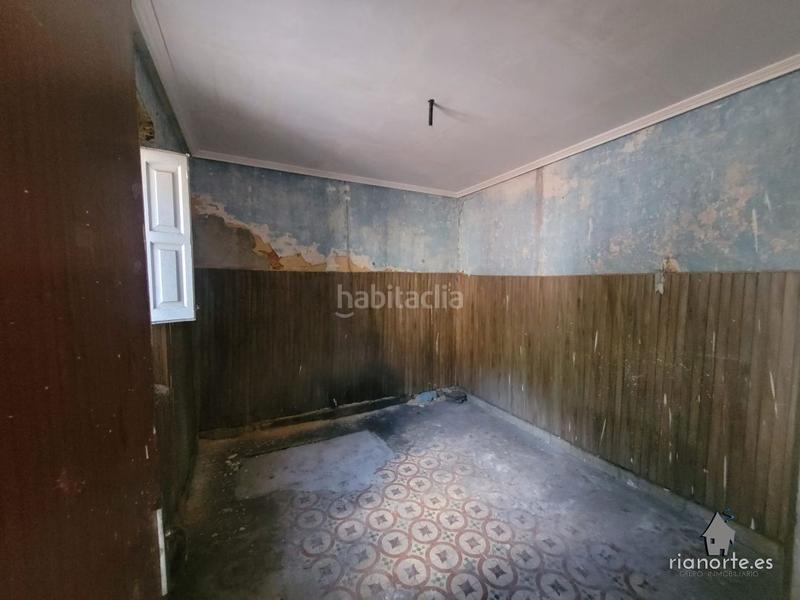 Foto 8b28df60-eaff-4ef0-a3e8-2ca2d19fcbe4. Casa  de planta baja y piso con patio trasero, en la vega, pando, para reformar. infórmese !! en Langreo