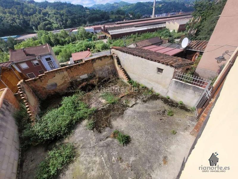 Foto 8cd67b5f-bbcb-4bd2-a87f-afaa13be0f62. Casa  de planta baja y piso con patio trasero, en la vega, pando, para reformar. infórmese !! en Langreo