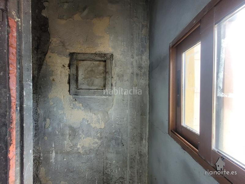 Foto e0f08faa-7529-47e3-b9e9-b9a2fd869b40. Casa  de planta baja y piso con patio trasero, en la vega, pando, para reformar. infórmese !! en Langreo