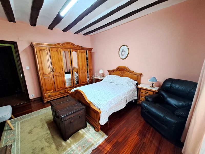 Foto 3ffdca8e-2539-4950-81b9-f4d425a70972. Casa aparellada amb xemeneia calefacció aparcament a Baños de Rioja