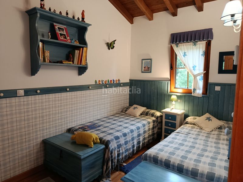 Foto ee819ceb-0d12-4aa1-b5f0-8acdbd89c258. Casa amb xemeneia calefacció aparcament piscina a Santiurde de Toranzo