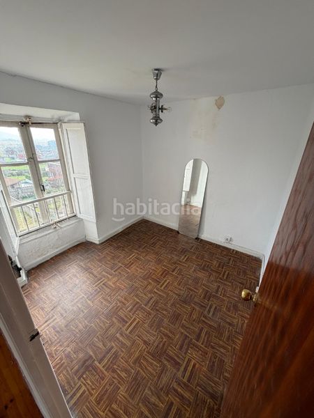 Foto adcd0a40-af52-4643-aaf6-82de4cf39c71. Casa conjunto de dos casas con parcela en Maliaño Camargo