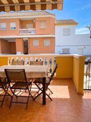 Casa adossada a Chilches. Amplio adosado con 4 dormitorios, terrazas y garaje junto a la p