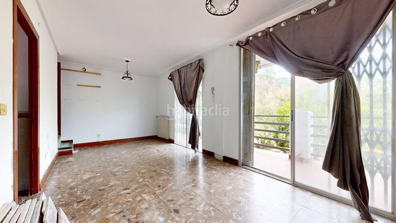 Foto e289a917-e279-490d-9221-4d0c5ee9a239. Casa adossada amb aparcament a Valle de Mena