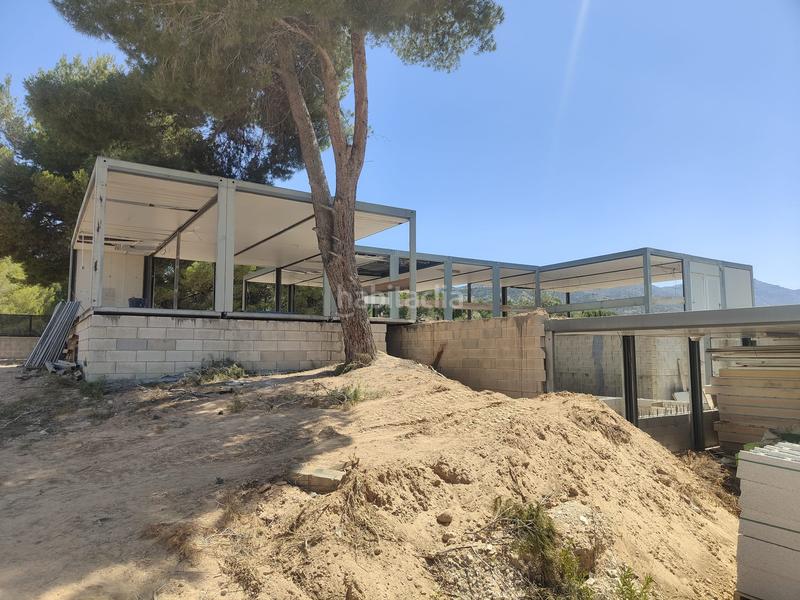 Foto cbd14327-82df-4270-b0a6-cef496b19cc6. Chalet avec cheminée parking piscine dans Tibi