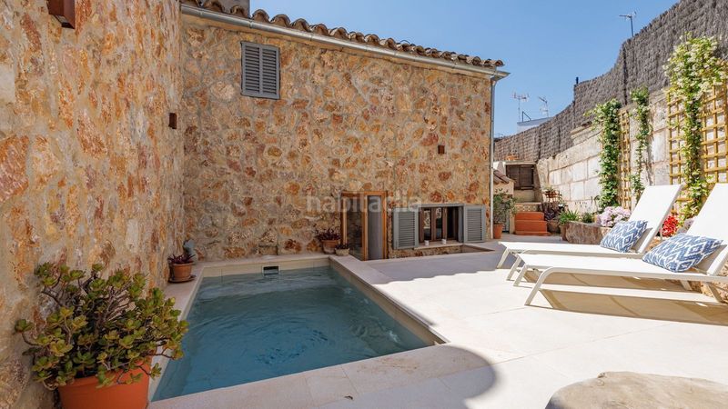 Foto 19c1539b-41c8-4d05-b1bd-4e74b98850b8. Casa adossada amb calefacció aparcament piscina a Pollença