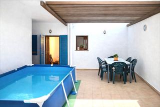 Apartament a Port de Pollen�a. Planta baja de 155 m2 en puerto pollensa cerca de la playa