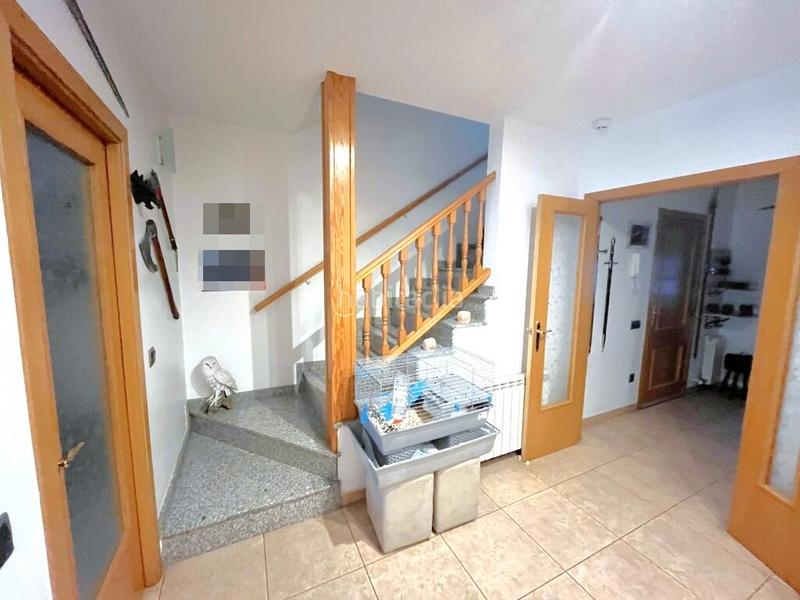 Foto d55c92a4-7a9d-49b7-bb77-b5577a6fb9be. Casa a schiera con camino riscaldamento parcheggio in Manlleu