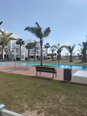 Planta baixa a Terrazas de la Torre Golf. Coqueto apartamento de dos dormitorios en roldan