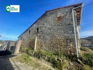 Masia  Barrio liao. Liao: casa adosada en esquina para rehabilitar.