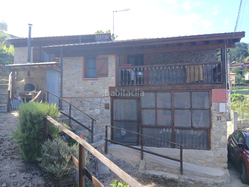 Foto a8eaf6df-70b4-4343-b669-a3ebf668f119. Casa amb xemeneia calefacció aparcament a Cangas de Onís