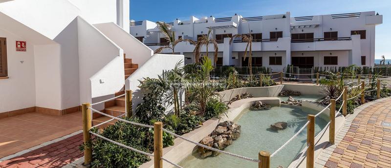 Foto c3a3690a-31ca-4e2b-b540-e71071d4c508. Planta baja moderno complejo residencial ubicado a pocos pasos de las playas playa los nardos y playa la entrevista, en la costa de almería.pu en San Juan de los Terreros