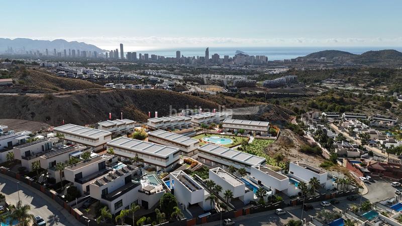 Foto 5b84921b-636b-4dfb-b803-ebf0533cf515. House with heating pool in balcón de Finestrat-terra marina Finestrat