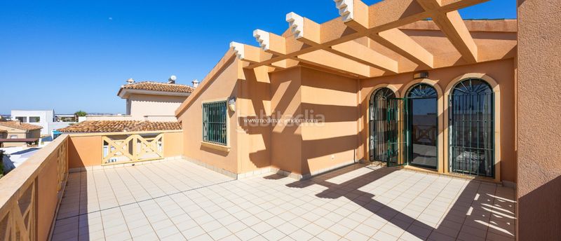 Foto 8fbec033-271d-4242-9a9c-17bd5fe9e891. Casa amb calefacció aparcament piscina a Centro de la Ciudad Quesada Rojales