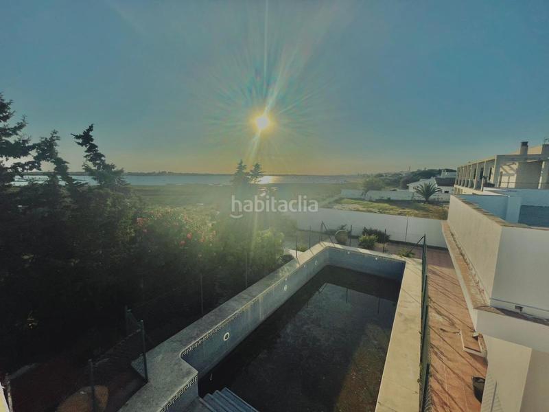 Foto 1c6b94c6-bff5-4115-94ca-fa91db346a57. Xalet amb aparcament a El Rompido