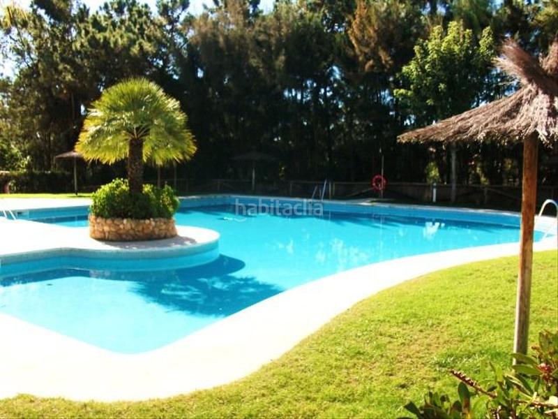 Foto 40c1174a-fd5b-4871-981c-0b12a91dd2c1. Semi detached house with parking in Islantilla golf Islantilla
