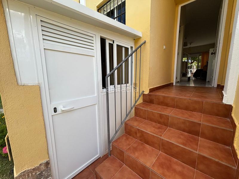 Foto 1b54c30a-ade8-40d9-9885-73690f2e2e68. Maison jumelée avec parking dans Islantilla golf Islantilla