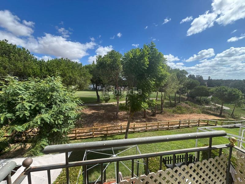 Foto b4094369-e8e6-48fc-a464-ac824ae37d7e. Maison jumelée avec parking dans Islantilla golf Islantilla