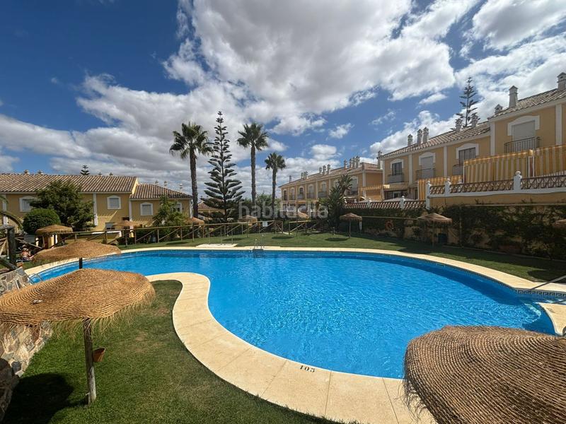 Foto e19eb62d-f4d3-4ce7-829f-ea32738bef6b. Maison jumelée avec parking dans Islantilla golf Islantilla