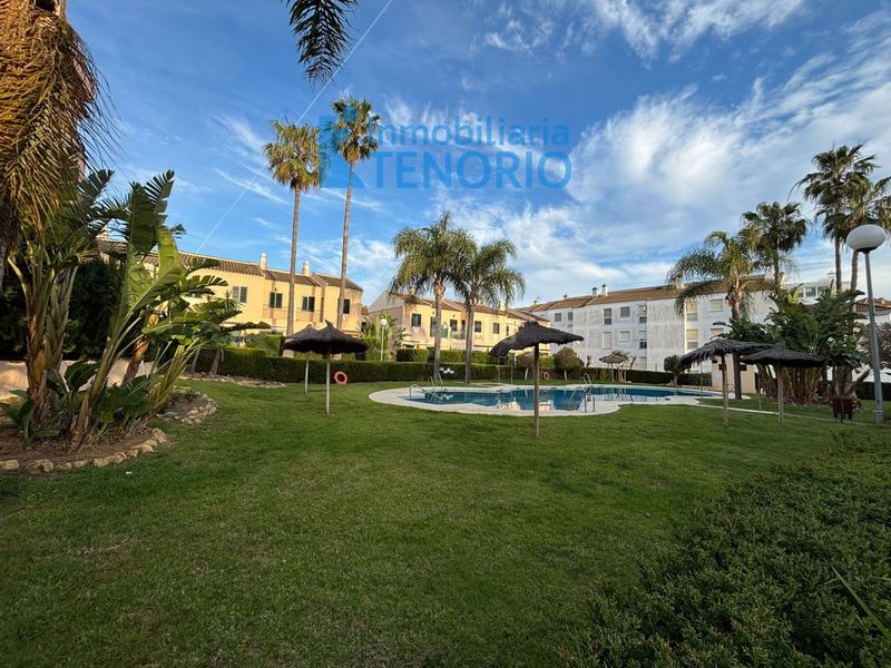 Foto f2358feb-0ce7-473d-8cb5-764466ac93e4. Casa adossada amb aparcament piscina a Islantilla costa Islantilla