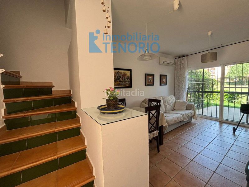 Foto 6f7ca298-6bd8-4b2f-9354-81406536f9ea. Casa adossada amb aparcament a Islantilla golf Islantilla