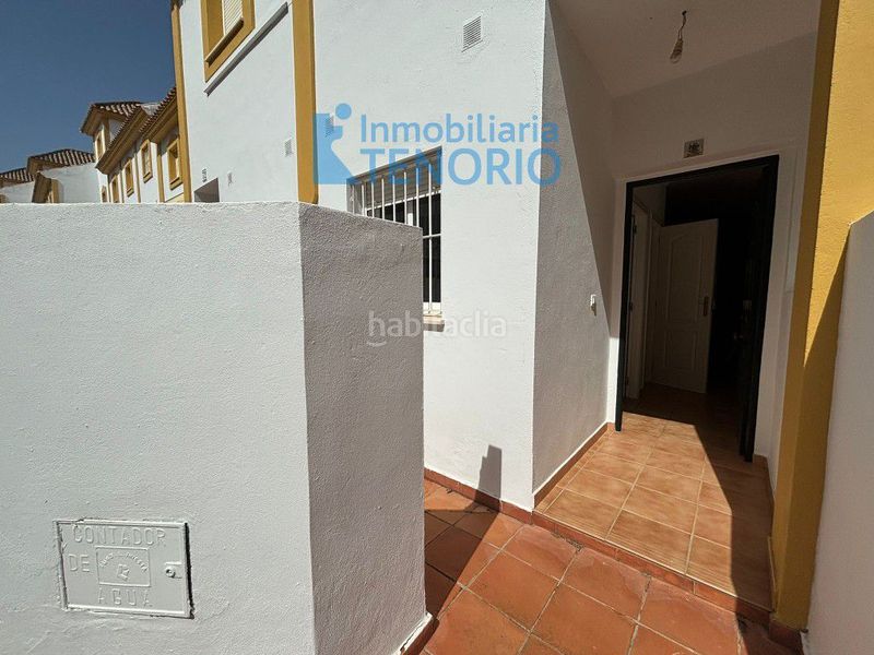 Foto e2279440-a129-4d19-a343-3dd6ea40cbf0. Casa adossada amb aparcament a Islantilla golf Islantilla