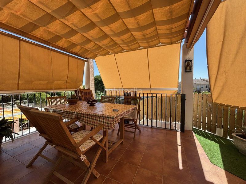 Foto ae730c6f-a85f-44d5-b80c-7aceac2eb29f. Casa adossada a n/a a Islantilla golf Islantilla
