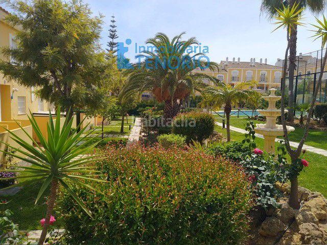 Foto 156c5caf-0444-4276-90b6-5c1288d0d199. Casa adossada amb aparcament piscina a Islantilla golf Islantilla