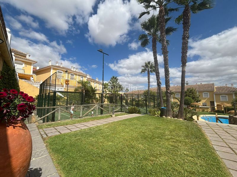 Foto cc16b6bc-9bd7-488e-b814-0953320e15e6. Casa adossada amb aparcament piscina a Islantilla golf Islantilla