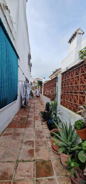 Foto 9e8973db-a917-4fb6-b7ad-35abc92e6af3. Casa pareada en Alcorrín Manilva