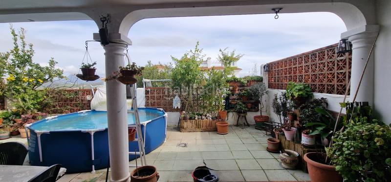 Foto cb76b462-a9df-4063-a801-8ada8087d80b. Casa pareada en Alcorrín Manilva