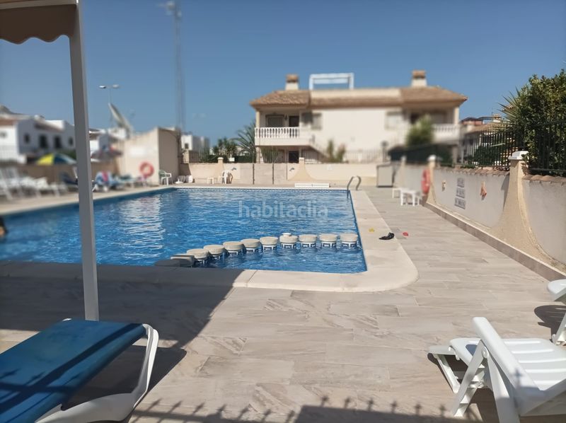 Foto 3c4bf698-208a-47fa-bab3-ef3f5f7ad166. Casa amb aparcament piscina a Los Almendros Orihuela