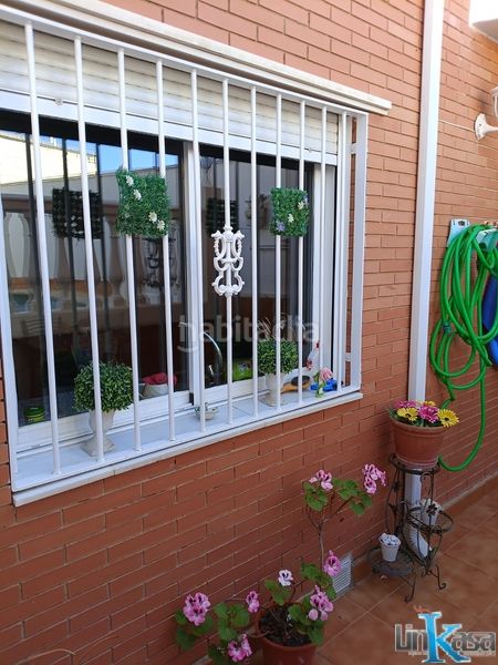 Foto acc01bac-1056-4888-ac95-8838c82d8e8d. Casa adossada amb xemeneia calefacció aparcament piscina a Linares