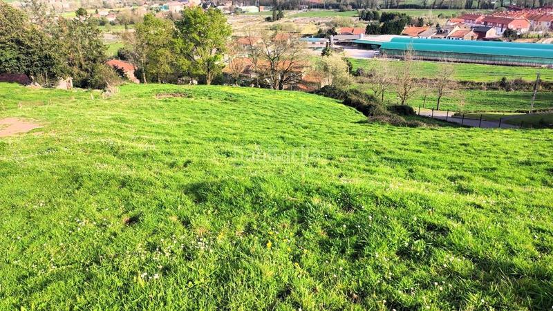 Foto b1cca919-9e00-41e0-967d-045d1aec64e2. Terreno residencial gran terreno urbano en Vioño pielagos en Piélagos