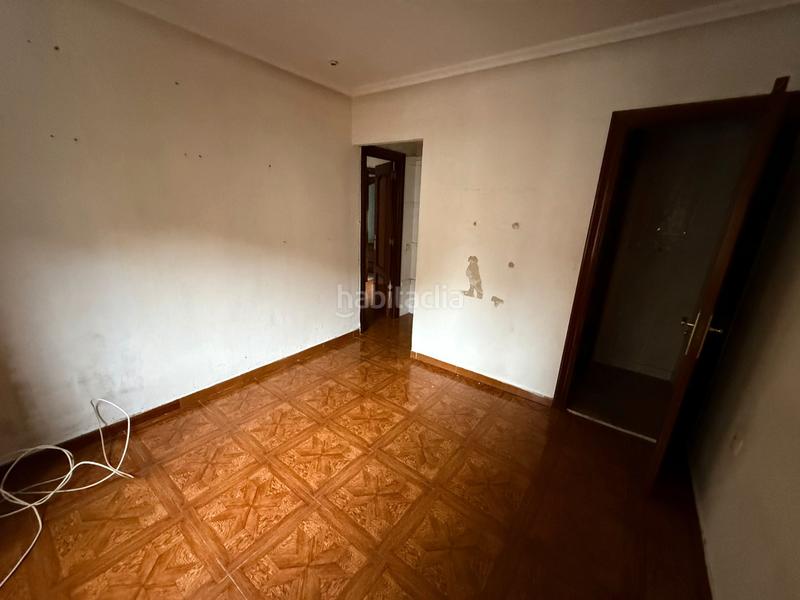 Foto c2c4f076-6666-4df0-ac6e-f96db0618ad5. Casa aparellada a calle nalona 27 a Sama Langreo