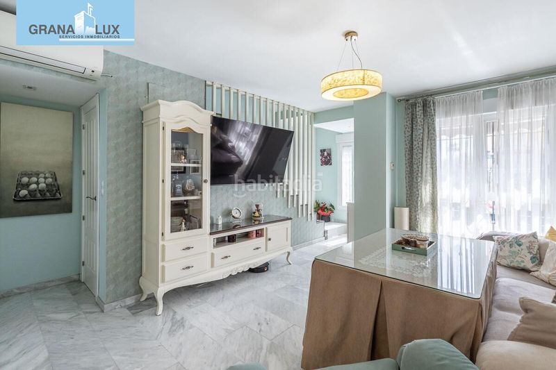 Foto 2430540f-c18d-4369-9344-c8d72553571c. Casa aparellada amb aparcament a Atarfe