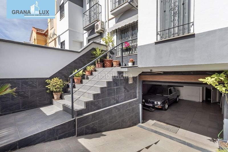 Foto 3bc48e4a-71a1-4478-be1f-d24c3f28a509. Casa aparellada amb aparcament a Atarfe