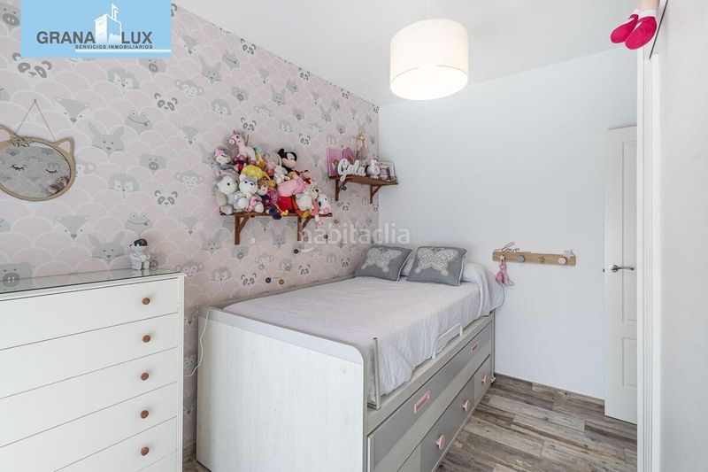 Foto 61a62370-9ae8-4581-a45c-8964124a2ac0. Casa aparellada amb aparcament a Atarfe