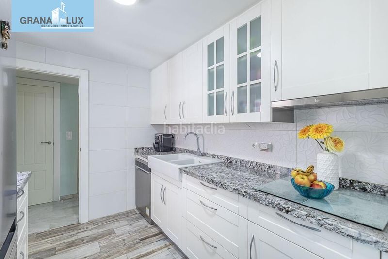 Foto bf78500f-2edf-42f1-88c7-633df660469c. Casa aparellada amb aparcament a Atarfe