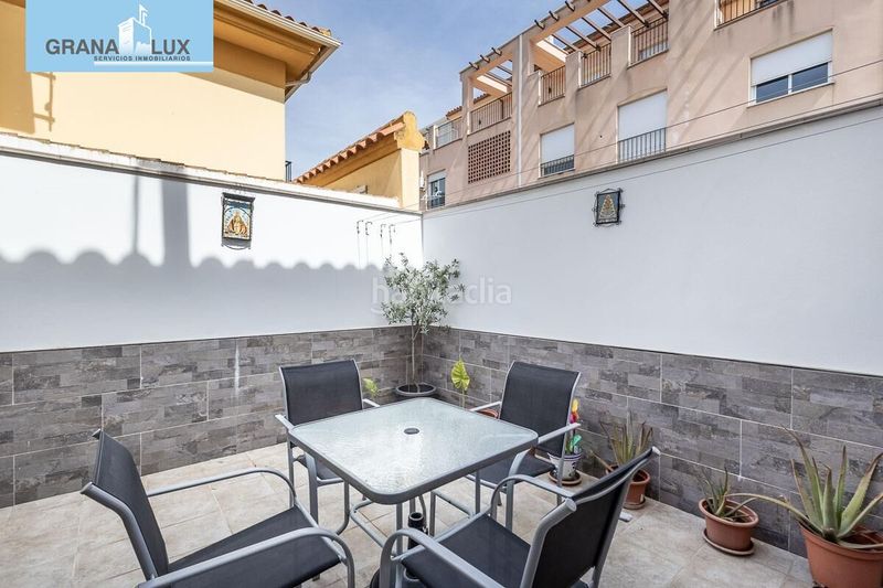 Foto ce98efd1-858e-49c6-a825-925184276dcf. Casa aparellada amb aparcament a Atarfe