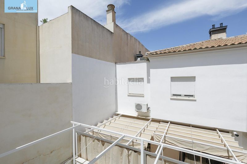 Foto 5a0740bb-0103-4427-8575-954eefc62af2. Casa adossada amb calefacció aparcament a San Miguel Armilla