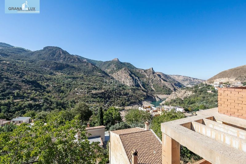 Foto 89caa943-ef55-4b0c-8d0d-1a646540ce82. Terreno residencial edificio en güejar sierra en Güéjar Sierra