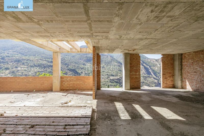 Foto c6cd6638-a632-40ce-b328-43112e9f217d. Terreno residencial edificio en güejar sierra en Güéjar Sierra