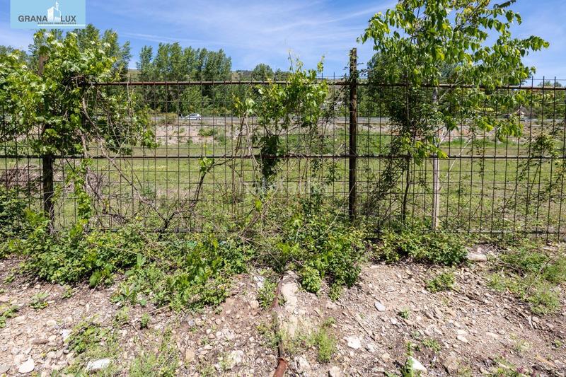 Foto 19a6584f-f3f0-4405-901e-487bf2450e2d. Rural plot in Cenes de la Vega