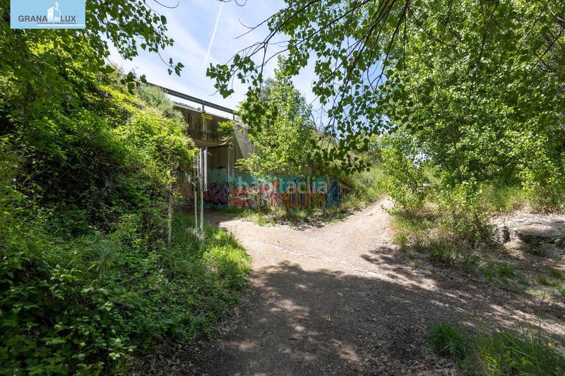 Foto a39dc1f0-0a17-489e-a71a-0efe3c6225f8. Rural plot in Cenes de la Vega