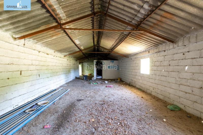 Foto f21f1dfd-5d31-4098-9ca4-910cb6a79a05. Rural plot in Cenes de la Vega