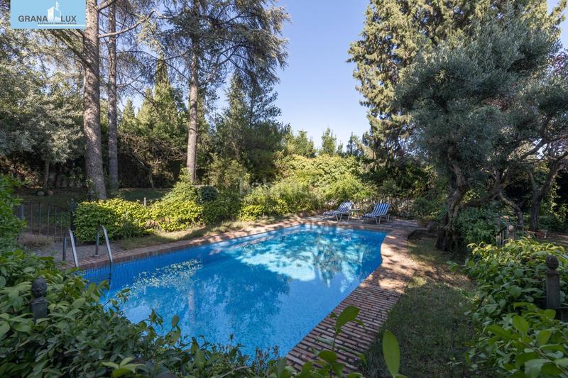 Foto 33ea67c5-9222-47f2-bd26-d33b9702cf20. Chalet magnifico chalet con amplio jardines y piscina en cortijo del aire! en Albolote