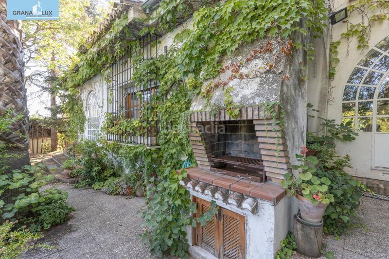Foto 9fb8e9de-5997-42a2-ab39-13d23104a84d. Chalet magnifico chalet con amplio jardines y piscina en cortijo del aire! en Albolote